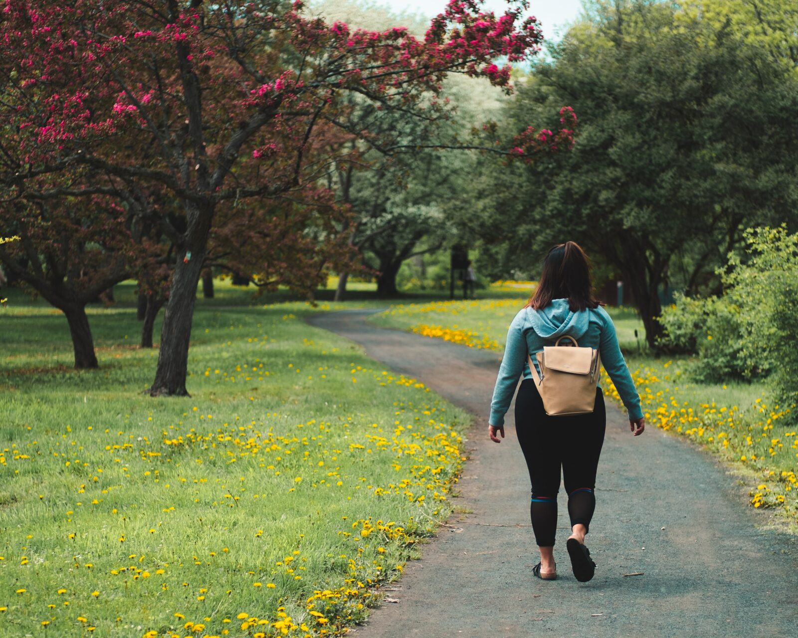 A girl out experiencing the health benefits of walking.