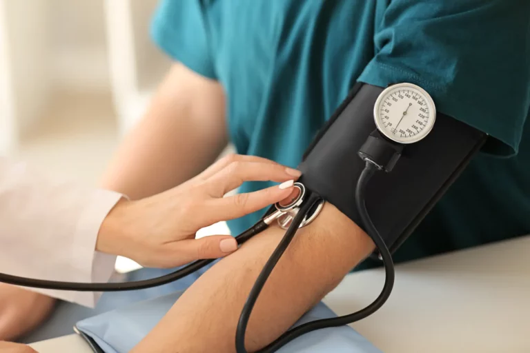 Membership-Based Doctoring with a closeup blood pressure equipment on patient.