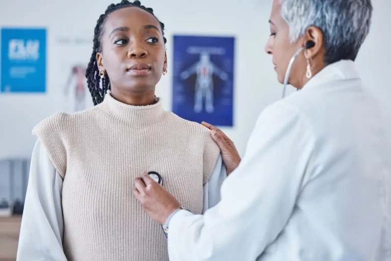 nurse listening to patients heartbeat after Primary Care Membership